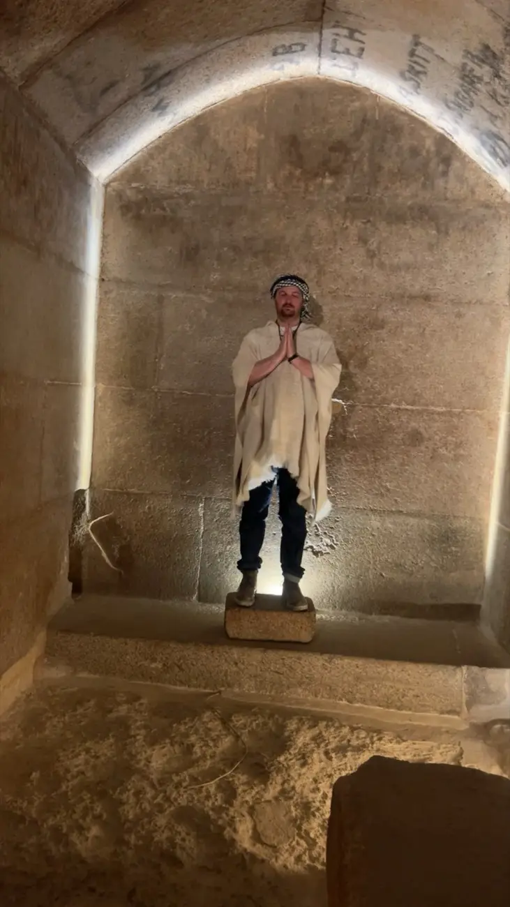 Inside the small pyramid in prayer, June 2026