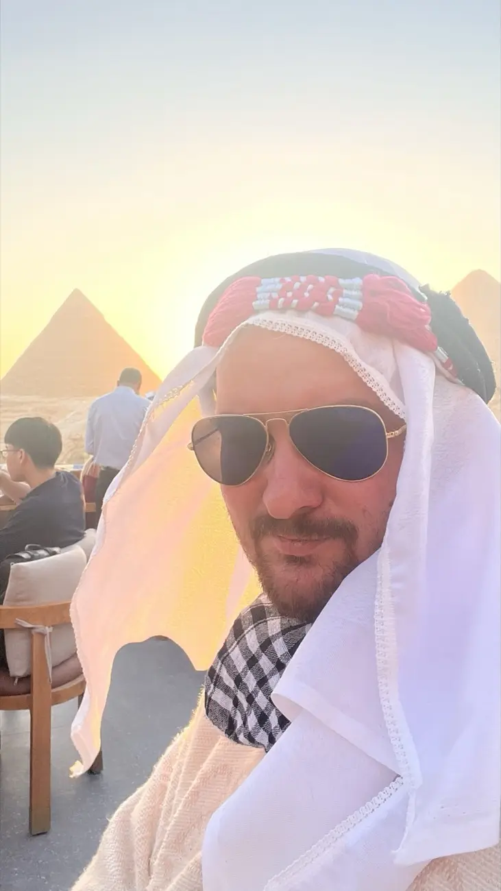 Jonas at sunset overlooking the Giza pyramids